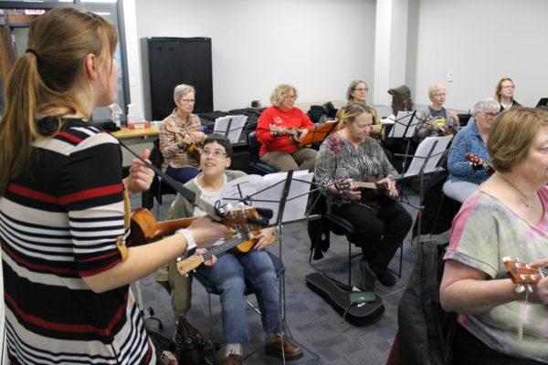 A group of people playing instruments